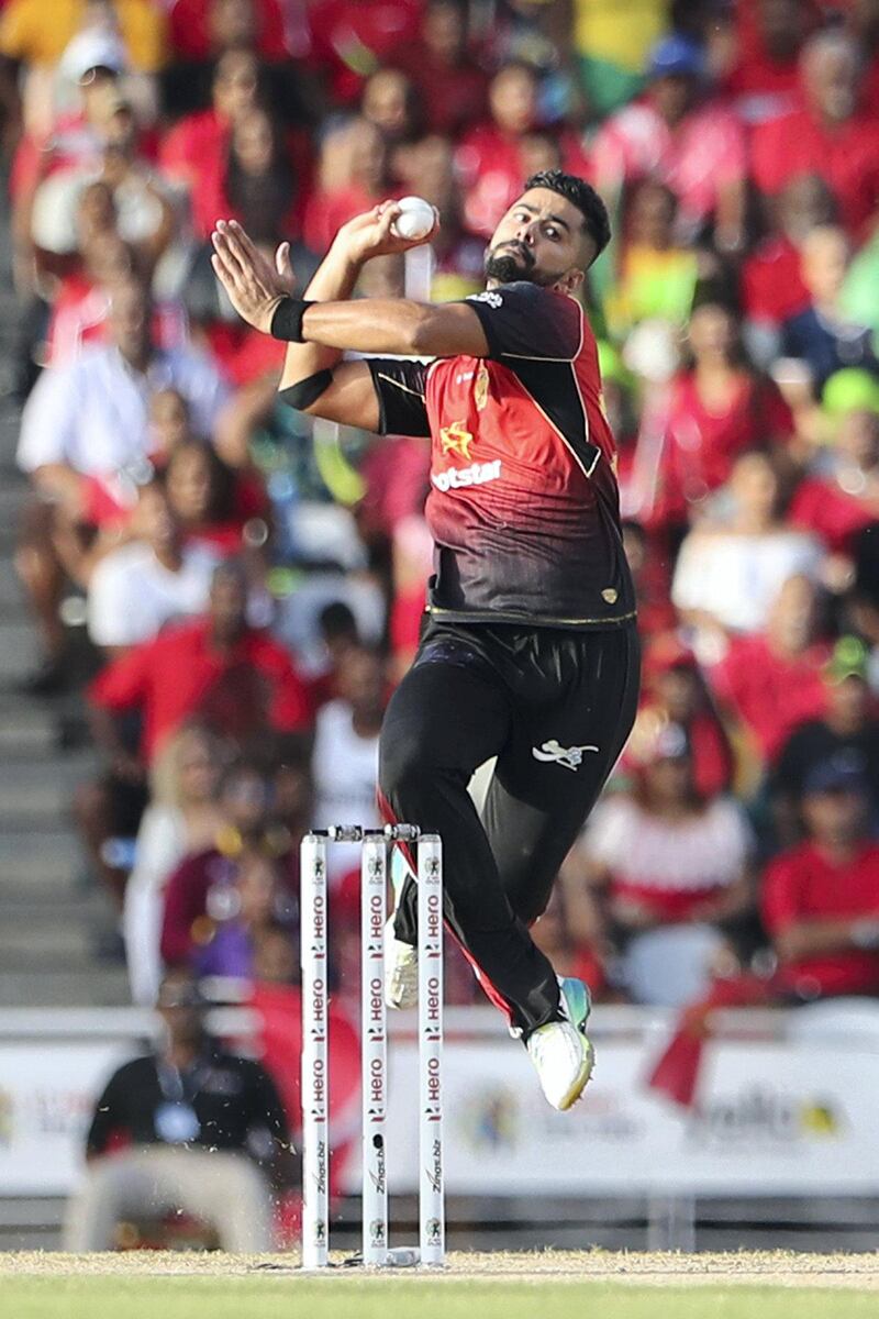 TAROUBA, TRINIDAD AND TOBAGO - SEPTEMBER 16:  In this handout image provided by CPL T20, Ali Khan of Trinbago Knight Riders bowls during the Hero Caribbean Premier League Final between Trinbago Knight Riders and Guyana Amazon Warriors at Brian Lara Stadium on September 16, 2018 in Tarouba, Trinidad and Tobago. (Photo by Ashley Allen - CPL T20/Getty Images)