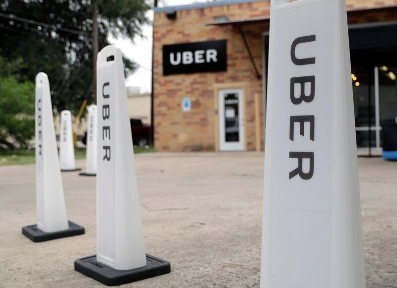 FILE- This May 26, 2017, file photo shows an Uber office in Austin, Texas. Ryan Graves, Uber's chief of global operations, resigned and investors sued the companyâ€™s former CEO. Graves told Uber staff in an email Thursday, Aug. 10, that he will transition out of his role as senior vice president of global operations in mid-September. That board, and its support for former CEO Travis Kalanick, was the subject of a lawsuit filed Thursday in Delaware Chancery Court by Benchmark Capital Partners. (AP Photo/Eric Gay, File)