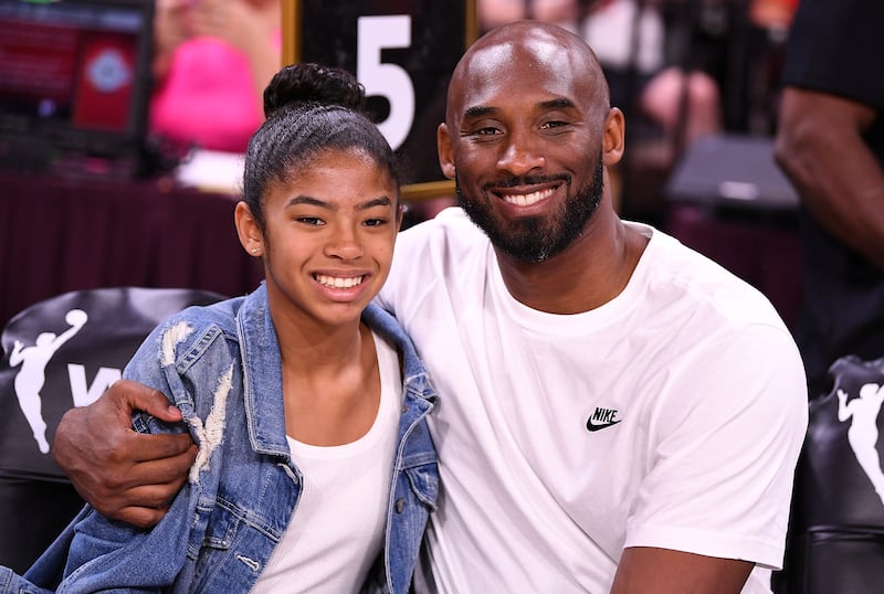 FILE PHOTO: Jul 27, 2019; Las Vegas, NV, USA; Kobe Bryant is pictured with his daughter Gianna at the WNBA All Star Game at Mandalay Bay Events Center. Mandatory Credit: Stephen R. Sylvanie-USA TODAY Sports/File Photo SEARCH "1ST ANNIVERSARY OF KOBE BRYANT'S DEATH" FOR THE PHOTOS.