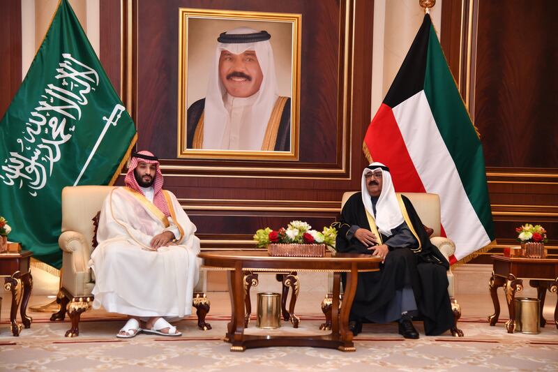 Kuwaiti Crown Prince Sheikh Mishal Al Sabah, right, receives Saudi Crown Prince Mohammed bin Salman in Kuwait City. EPA