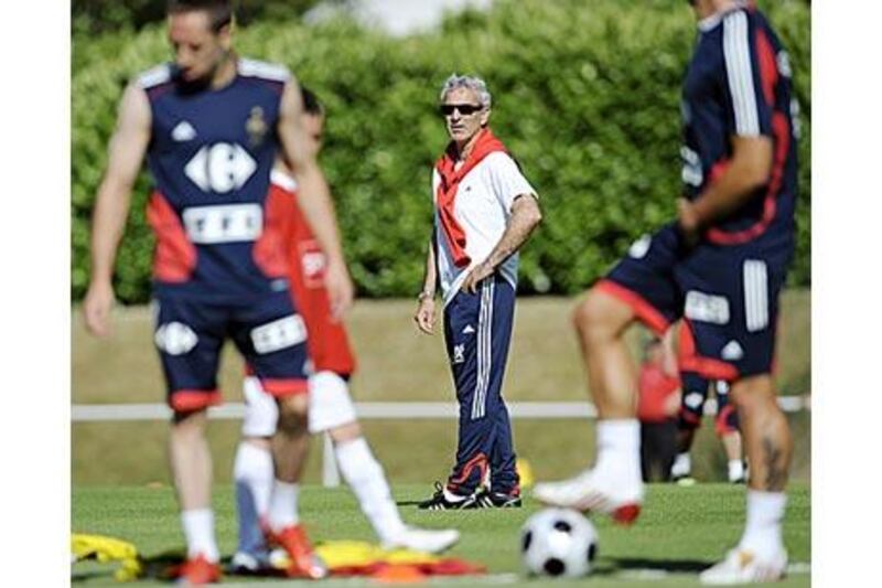 France national manager Raymond Domenech watches his players train ahead of the June friendly against Turkey
in Lyon. France will resume their 2010 World Cup campaign tomorrow away to the Faroe Islands.