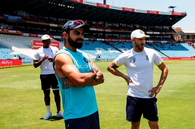 (FILES) This file photo taken on January 17, 2018 shows Indian Captain Virat Kohli (C), South African Captain Faf du Plessis, and bowler Lungi Ngidi (L) waiting on the side for their post match interview after South African team won the second test match and the series against India during the fifth day of the second test cricket match between South Africa and India at the Supersport cricket ground in Centurion.
Kohli on January 18 was crowned cricketer of the year by the sport's world governing body, capping off a strong innings for the Indian skipper across all three formats. / AFP PHOTO / GIANLUIGI GUERCIA