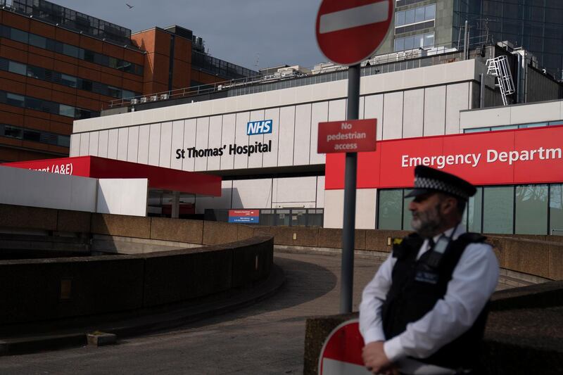 epa08351067 A policeman outside St.Thomas' Hospital in London, Britain, 08 April 2020. According to reports, British Prime Minister Boris Johnson is in a stable condition but remains the Intensive Care Unit of St. Thomas' Hospital where he is being treated for Coronavirus. Countries around the world are taking increased measures to stem the widespread of the SARS-CoV-2 coronavirus which causes the Covid-19 disease.  EPA/WILL OLIVER