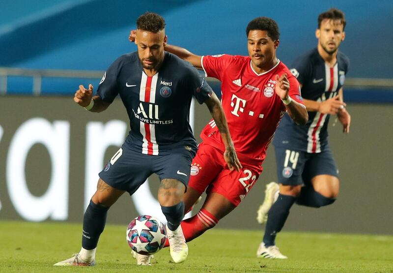 Neymar of PSG under pressure from Bayern's Serge Gnabry. EPA