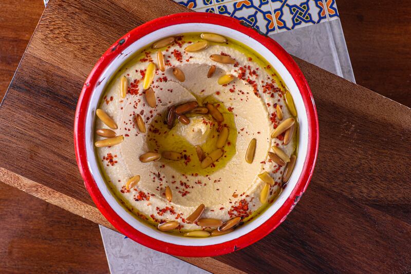 The hummus with pine nuts is a must-try dish, says chef Dakkak