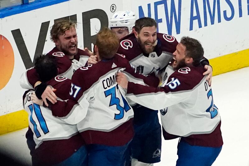 The Colorado Avalanche celebrate after the team defeated the Tampa Bay Lightning in Game 6 of the NHL hockey Stanley Cup Finals. AP Photo