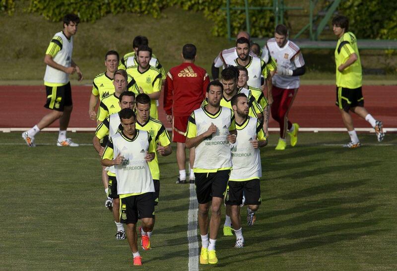 Spain players get in a run during Monday's team training session for the 2014 World Cup. Dani Pozo / AFP / May 26, 2014
