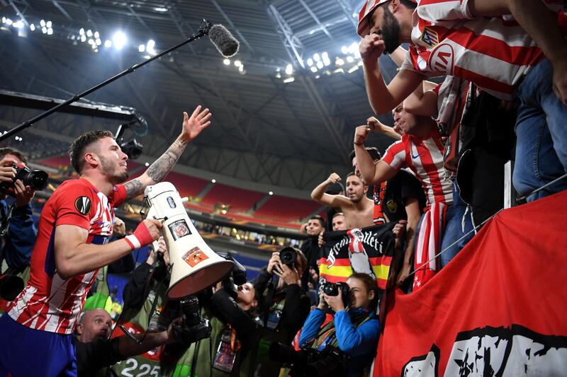Saul Niguez of Atletico Madrid celebrates with fans after victory in the UEFA Europa League Final between Olympique de Marseille and Club Atletico de Madrid at Stade de Lyon in Lyon, France, on May 16, 2018. Matthias Hangst / Getty Images