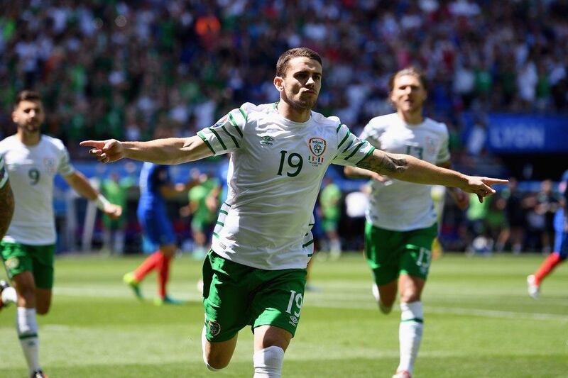 Robbie Brady celebrates scoring the opening goal from the penalty spot. Laurence Griffiths / Getty Images