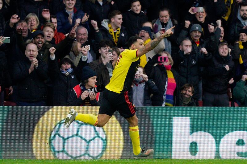 epa08086907 Watford's Troy Deeney celebrates after scoring during the English Premier League soccer match between Watford and Manchester United at Vicarage Road Stadium, London Britain, 22 December 2019.  EPA/WILL OLIVER EDITORIAL USE ONLY. No use with unauthorized audio, video, data, fixture lists, club/league logos or 'live' services. Online in-match use limited to 120 images, no video emulation. No use in betting, games or single club/league/player publications