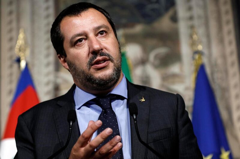 FILE - In this Monday, May 14, 2018 file photo, Leader of the League party, Matteo Salvini, addresses the media after meeting with Italian President Sergio Mattarella, at the Quirinale presidential palace, in Rome. The first group of migrants to arrive in Italy since a populist government took office is at the center of a spat between Italy's new interior minister and fellow EU member Malta. Some 230 African migrants landed in Calabria on Saturday after receiving authorization from the Interior Ministry. But before their ship docked, Interior Minister Matteo Salvini lashed out at Malta for allegedly denying the vessel permission to port. (Riccardo Antimiani/ANSA via AP)