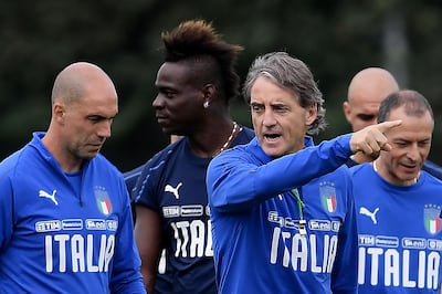 Mario Balotelli has teamed up with Roberto Mancini at Italy. AFP