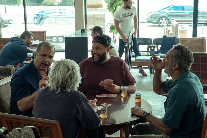 Palestine and politics are debated in shisha-smoking cafes over a game of backgammon or cards, in 'Mo'.