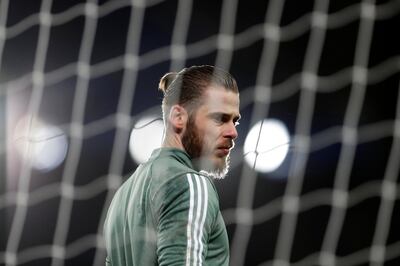 Soccer Football - Premier League - Everton vs Manchester United - Goodison Park, Liverpool, Britain - January 1, 2018   Manchester United's David De Gea warms up before the match    Action Images via Reuters/Lee Smith    EDITORIAL USE ONLY. No use with unauthorized audio, video, data, fixture lists, club/league logos or "live" services. Online in-match use limited to 75 images, no video emulation. No use in betting, games or single club/league/player publications.  Please contact your account representative for further details.
