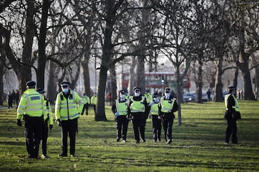 Police officers patrol in Clapham Common in south London. AFP