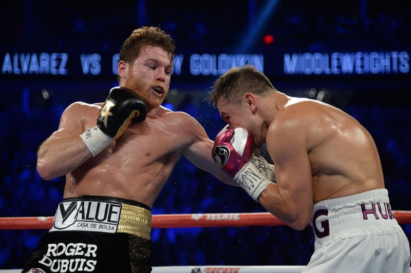 Sep 15, 2018; Las Vegas, NV, USA; Canelo Alvarez (black trunks) and Gennady Golovkin (white trunks) box in the middleweight world championship boxing match at T-Mobile Arena. Alvarez won via majority decision. Mandatory Credit: Joe Camporeale-USA TODAY Sports