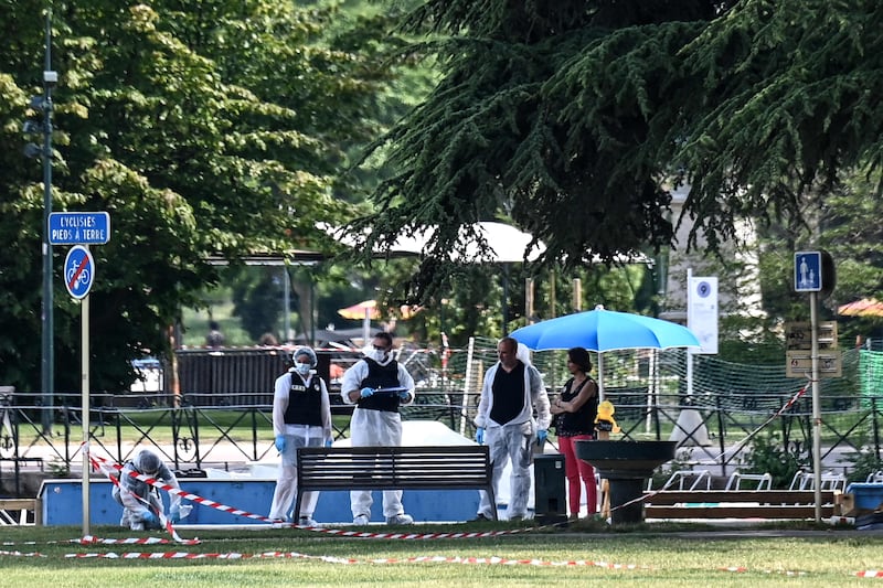 Forensic police officers at the scene of the stabbing attack in Annecy. AFP