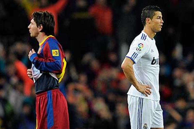 Cristiano Ronaldo, right, and Lionel Messi were worlds apart in Barcelona's 5-0 thrashing of Real Madrid.