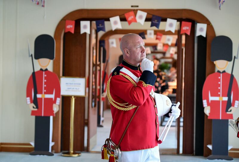 A man dressed as an English Guard takes part in the colourful pageantry