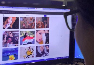 A person looks at the profile page of Iraqi model and Instagram starlet Tara Fares in Baghdad on September 28, 2018.  Fares has been shot dead at the wheel of her Porsche convertible in central Baghdad, sending ripples through social media circles. The interior ministry opened a probe into yesterday's murder of the 22-year-old who suffered "three fatal bullet wounds" as she drove through the capital's Camp Sarah district.
 / AFP / STRINGER

