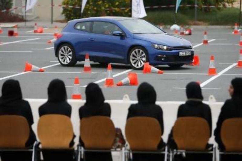 A student shows his ability - or lack of it - in the FedEX Express Driving Skills Challenge held at Higher Colleges of Technology Dubai Men's Campus. Three knocked-down cones led to disqualification. Pawan Singh / The National