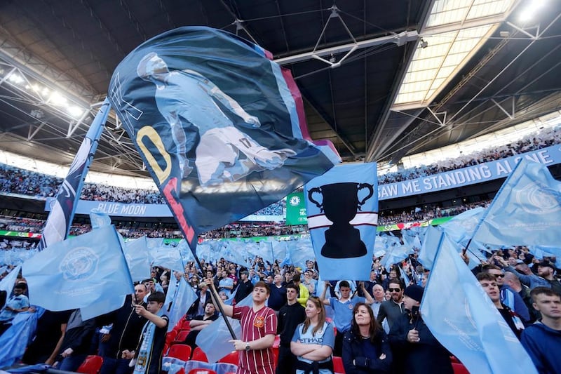 Manchester City fans celebrate winning the League Cup final at Wembley last month. Reuters