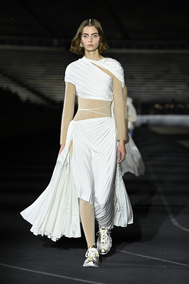 A model walks the runway during the Dior Cruise show 2022 at Panathenaic Stadium on June 17, 2021 in Athens, Greece. Getty Images