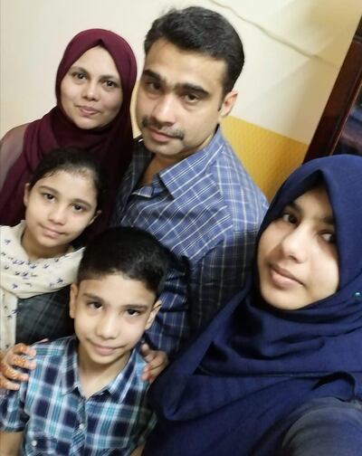 Residents of Sharjah, the Ali family pictured before they left the UAE, Ishal (far left) with her mother Shamila, father Sulfikar, younger siblings Mohamed Zishan and Ishan. The children travelling with their mother survived the crash that killed 18 passengers when an Air India Express plane overshot the runway in southern India's Kozhikode city. Their father Sulfikar was not on the flight. Courtesy Sulfikar Ali 