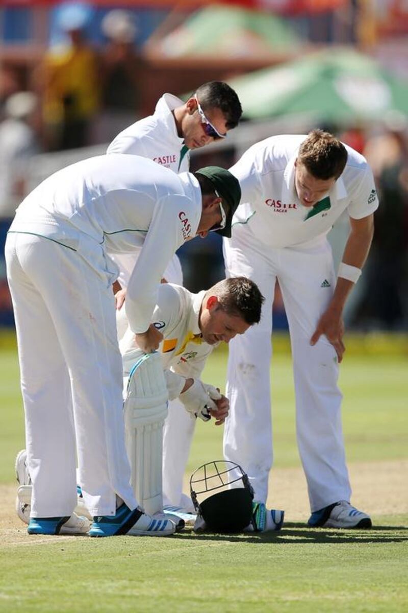 Michael Clarke, the Australia captain, goes down after getting hit by a delivery from Morne Morkel, the South Africa fast bowler, during the Cape Town Test match in March. Morne de Klerk / Getty Images