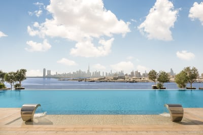 The peaceful infinity pool, with a Burj Khalifa skyline. Photo: Address Grand Creek Harbour