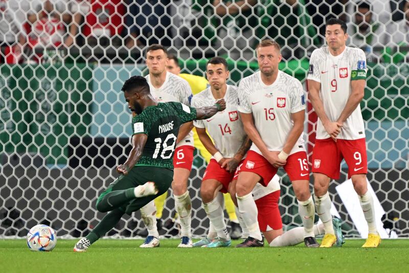 Nawaf Al Abed lines up a free kick for Saudi Arabia against Poland. AFP