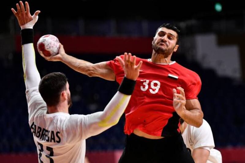 Egypt's left back Yehia Elderaa shoots during the men's semifinal handball match between France and Egypt of the Tokyo 2020 Olympic Games at the Yoyogi National Stadium in Tokyo on August 5, 2021. (Photo by Fabrice COFFRINI  /  AFP) (Photo by FABRICE COFFRINI / AFP via Getty Images)