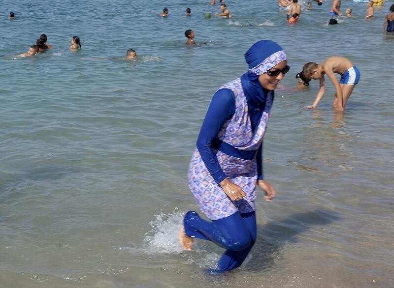 A woman wearing a burqini on a beach in Marseille, France.  Reuters