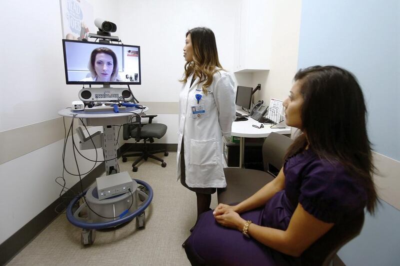 The “virtual doctor” is catching on in many countries as more patients access medical care and advice through their laptops and smartphones. Reuters