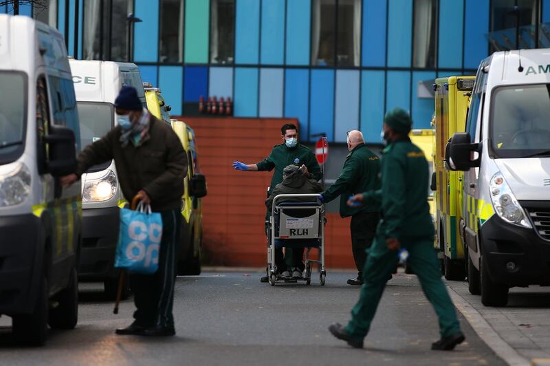 Paramedics wheel a patient into The Royal London Hospital. Getty Images