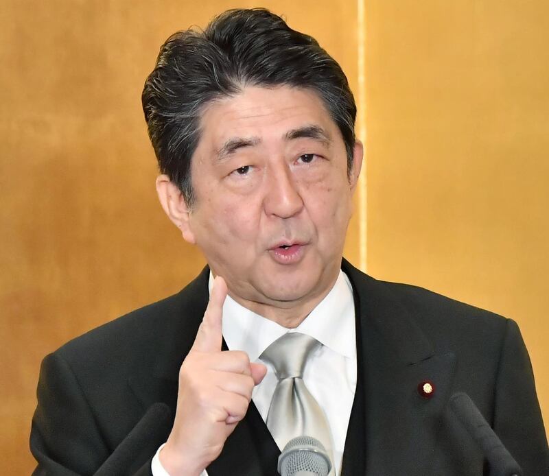 Japanese Prime Minister Shinzo Abe speaks during a press conference in Ise, central Japan, Thursday, Jan. 4, 2018.  Abe says North Korea should change its policies to help enrich its people.  Abe told reporters Thursday, Jan, 4,  that Japan would do its utmost, working with the U.S. and South Korea, to pressure Pyongyang to shift its course and end its missile tests and nuclear program. (Yoshiaki Sakamoto/Kyodo News via AP)