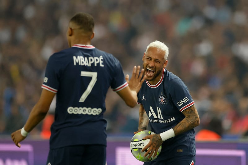  Kylian Mbappe celebrates scoring PSG's fourth with Neymar. Neymar