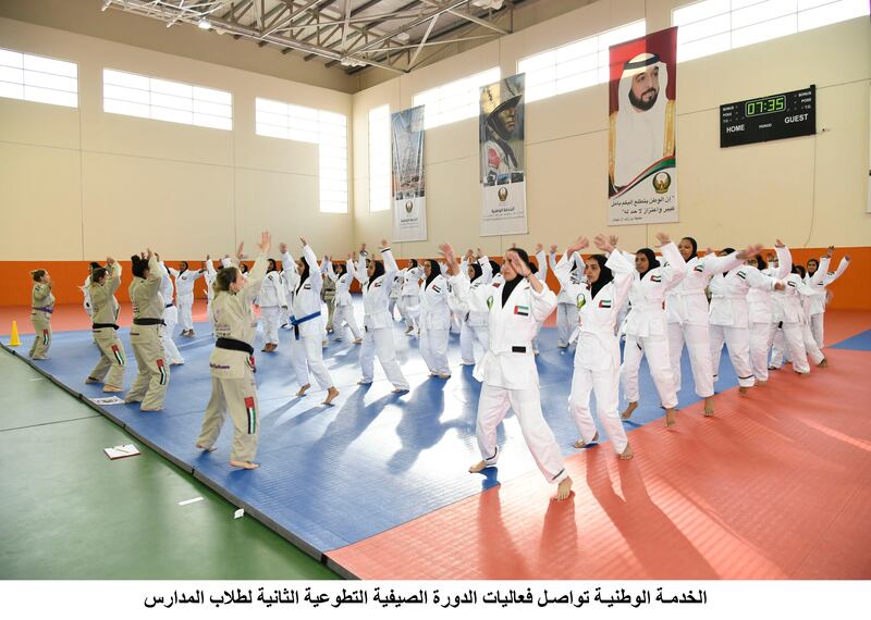 Emirati pupils take part in a military training summer camp at the National Service Training Centre in Al Ain. Wam