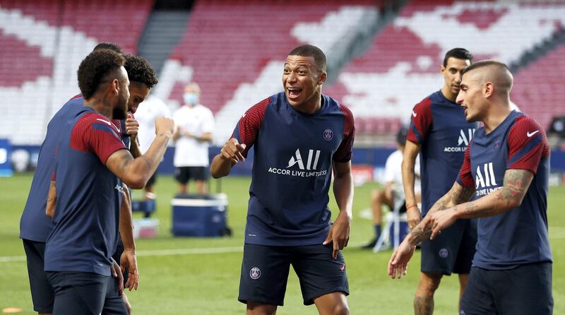 LISBON, PORTUGAL - AUGUST 22: Neymar and Kylian Mbappe of Paris Saint-Germain interact during a training session ahead of their UEFA Champions League Final match against Bayern Munich at Estadio do Sport Lisboa e Benfica on August 22, 2020 in Lisbon, Portugal. (Photo by Matthew Childs/Pool via Getty Images)