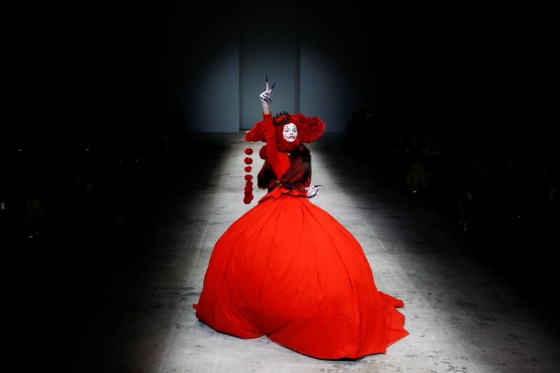 A model presents a creation by Hu Sheguang at China Fashion Week in Beijing. Thomas Peter / Reuters