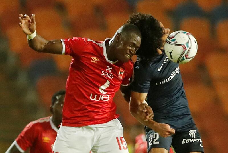 Al Ahly's Aliou Dieng in action with Enppi's Ahmed Sobhi El Agouz during the  Egyptian Premier League football match between Al Ahly and Enppi at Cairo International Stadium. Reuters