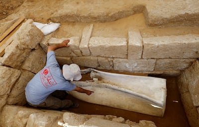 Fadel Al-A'utul, an expert from the French School of Biblical and Archeological Research, works in a Roman-era cemetery in Gaza. Reuters
