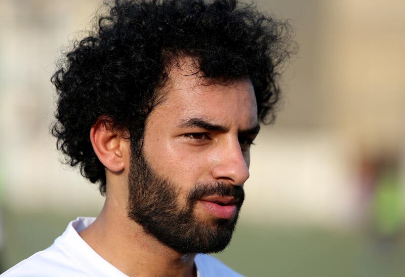 the "Mohamed Salah of Iraq" can't leave his house without being stopped for photographs or approached by football fans who mistake him for the Egyptian star. Sabah Arar / AFP
