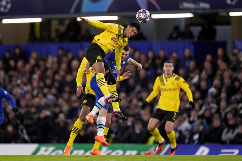 Chelsea's Mateo Kovacic and Borussia Dortmund's Jude Bellingham jump for the ball. PA