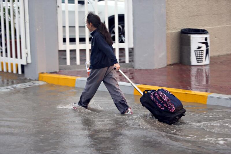 Heavy rain swept over Abu Dhabi Thursday morning as commuters went to work and school. Sammy Dallal / The National 





