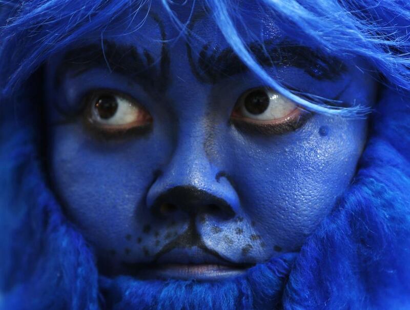 A fan dressed as X-Men character Beast waits for cast members at the South East Asia premiere of X-Men: Days Of Future Past in Singapore 14 May, 2014. Reuters