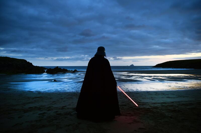 501st Garrison Ireland Legion member John O'Dwyer dressed as the character Darth Vader looks out towards Skellig Michael island in Portmagee, Ireland. The latest Star Wars movies such as The Last Jedi have featured the famous Skellig Michael islands situated off the coast of the small Irish fishing village.  Getty