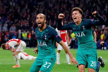 ottenham's Lucas Moura, left, celebrates scoring their third goal to complete his hat-trick with Dele Alli. Reuters