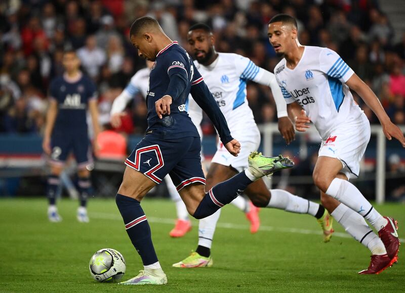 Paris Saint-Germain's French forward Kylian Mbappe shoots during the Ligue 1 match against Marseille at the Parc des Princes in Paris on April 17, 2022. AFP