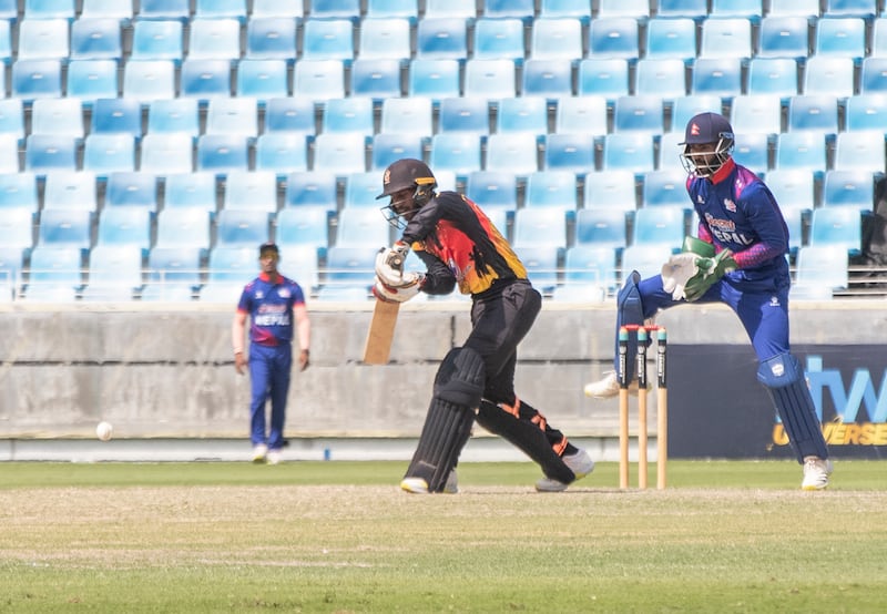 Riley Hekure of Papua New Guinea at the crease.